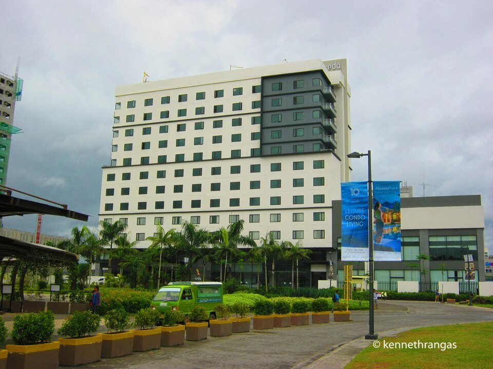 Seda Hotel in Davao City, showing the multi-storey hotel building, landscaped grounds and nearby streets.